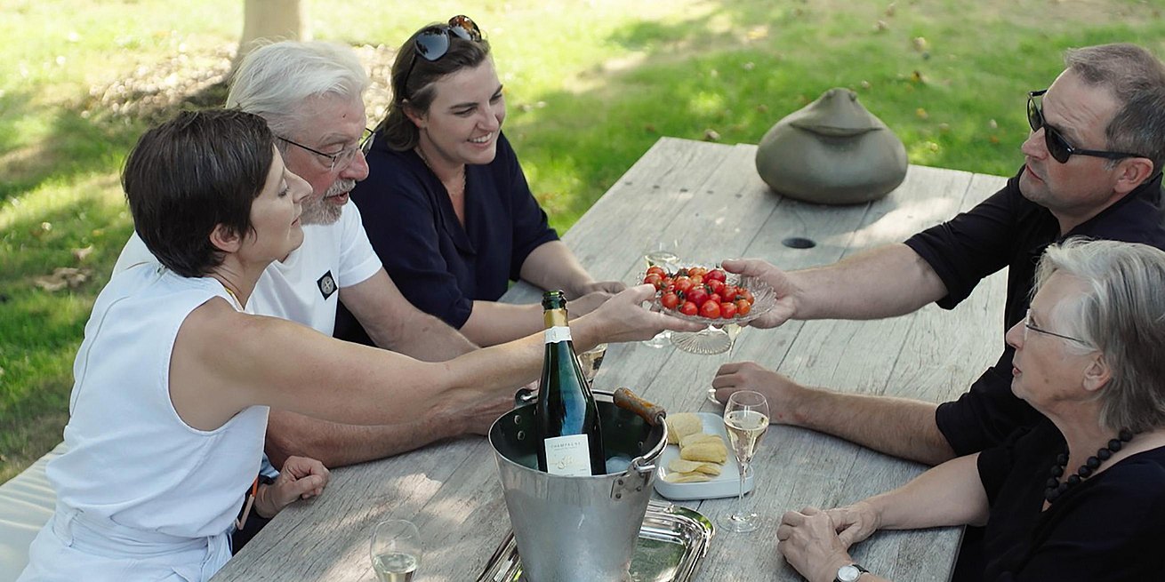 La famille Van Damme dans le jardin.