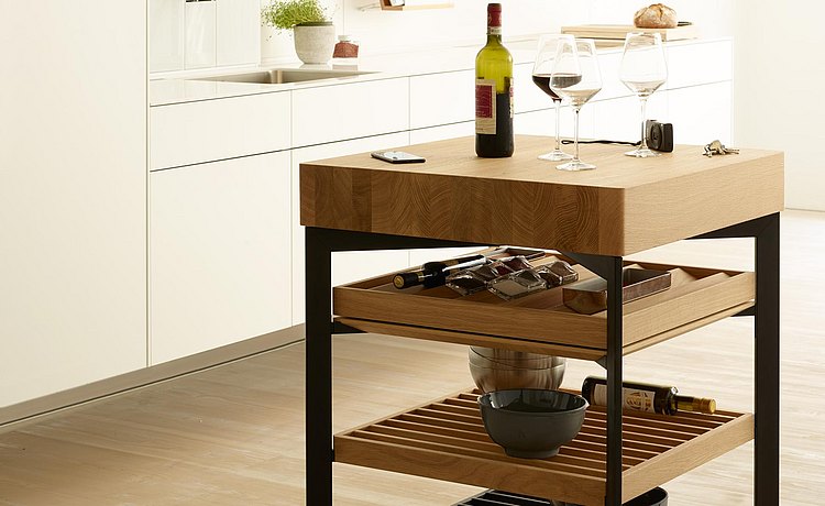 Perfect place for wine accessories or for serving the roast next to the table