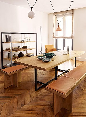 Las combinaciones de mesas y bancos garantizan mucho espacio para comer y habitar