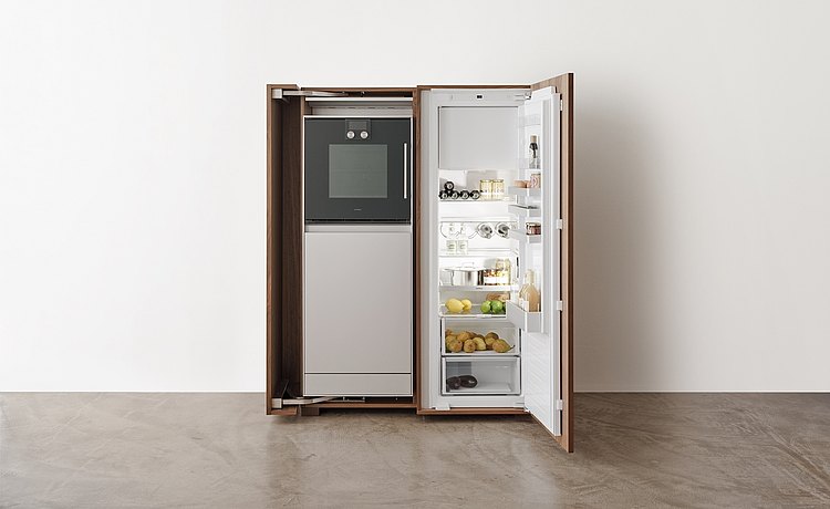 The equipment cabinet accommodates the refrigerator and stove perfectly